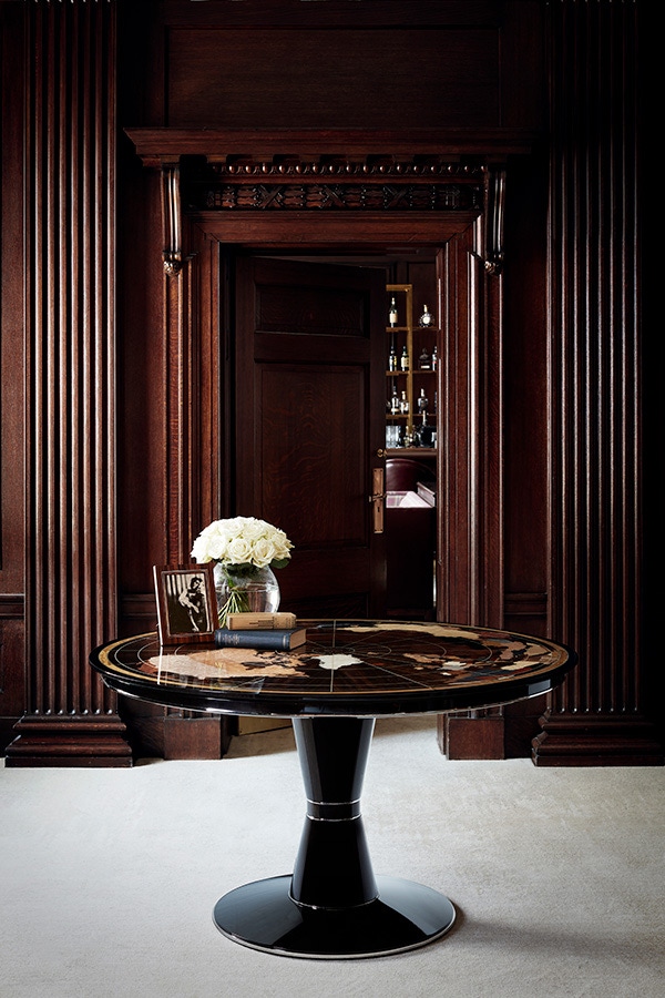 Hand-crafted and using over 40 individually selected veneers, the main body of the World Map table is created out of stained walnut in a high gloss finish. The base features elegant nickel stringing. The table’s inlay is a combination of ripple sycamore and numerous natural and hand-dyed veneers including ash burr, quilted maple, lacewood, fumed eucalyptus and ziracote.