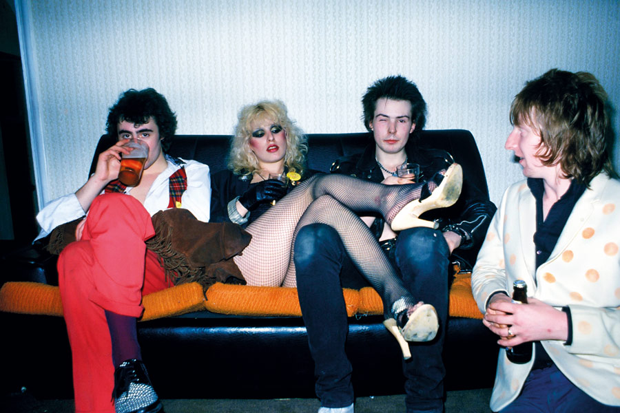 Glen Matlock, Nancy Spungen, Sid Vicious and Rat Scabies in London, 1978. Photograph by Getty Images.