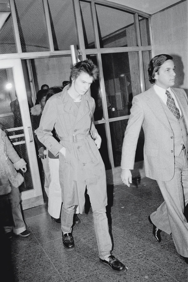 Arriving at court in Manhattan for the trial of the murder of Nancy Spungen, 1978. Photograph by Getty Images.