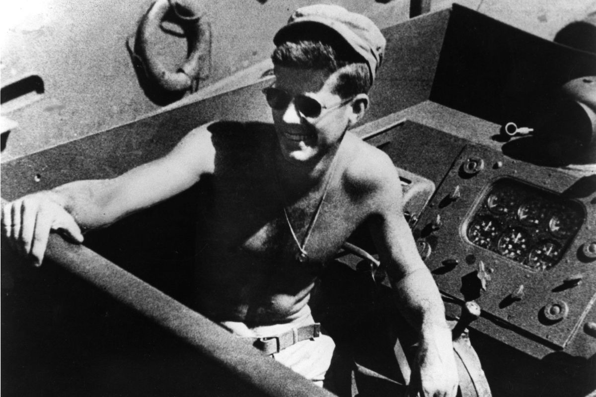 Kennedy aboard the torpedo boat he commanded in the second world war as a naval lieutenant (Photo by MPI/Getty Images)