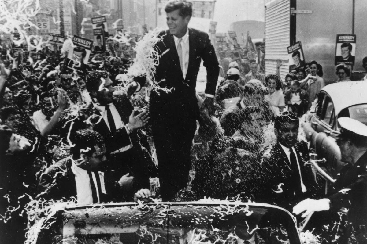 Senator Kennedy at a parade during his presidential campaign, 1960 (Photo by Keystone/Getty Images)