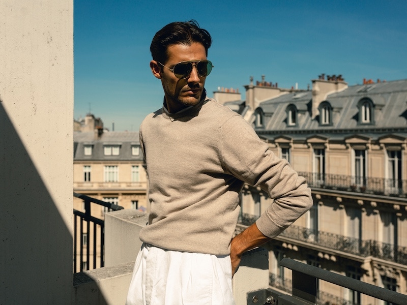 Anderson & Sheppard knit, vintage trousers and sunglasses from Broadway & Sons. Photo by Milad Abedi.