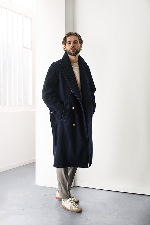 De Bonne Facture's navy wool trench coat is the ultimate winter wardrobe staple.