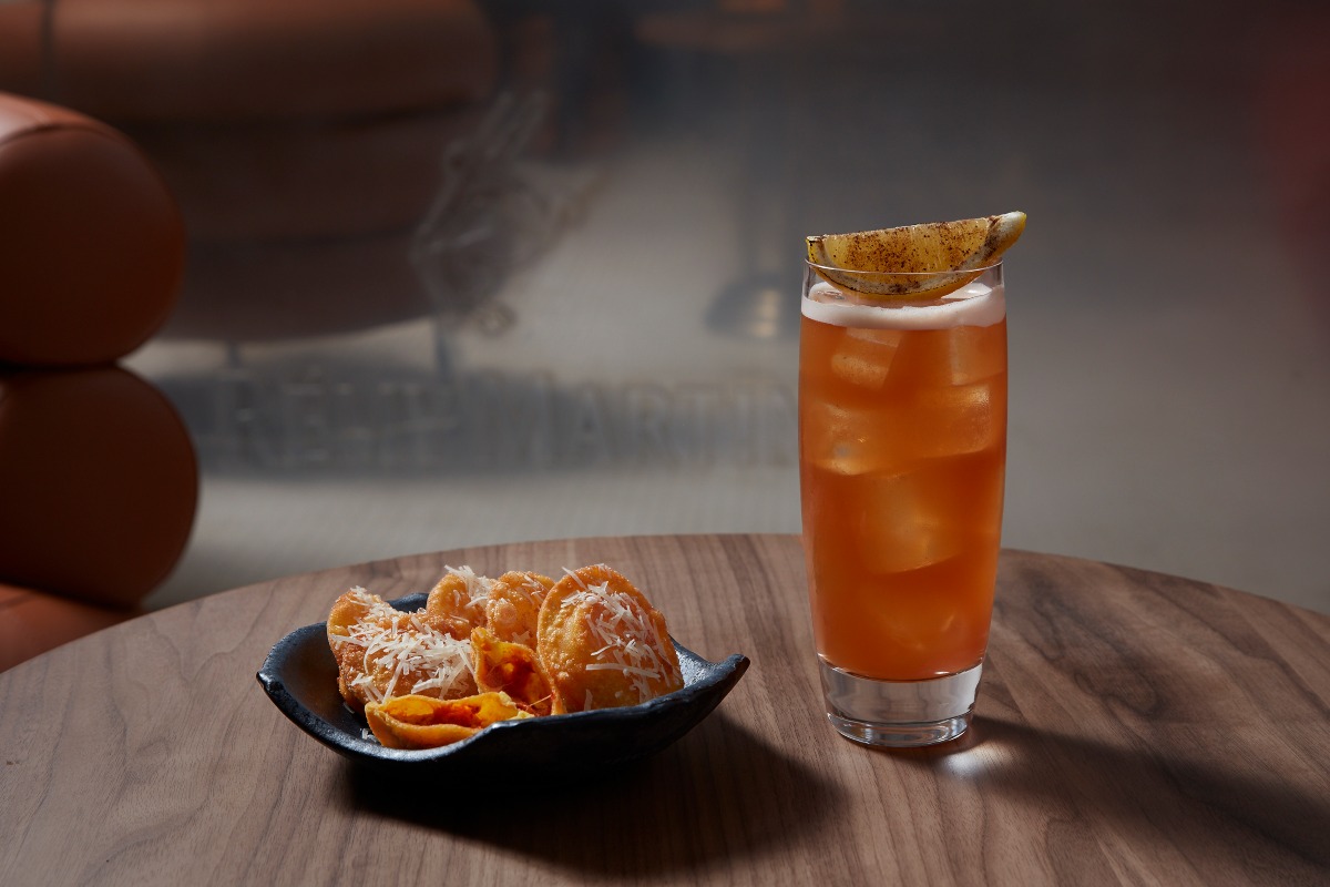 Fish House Punch with Crispy Ravioli of Nduja Sausage and Grated Aged Parmesan.