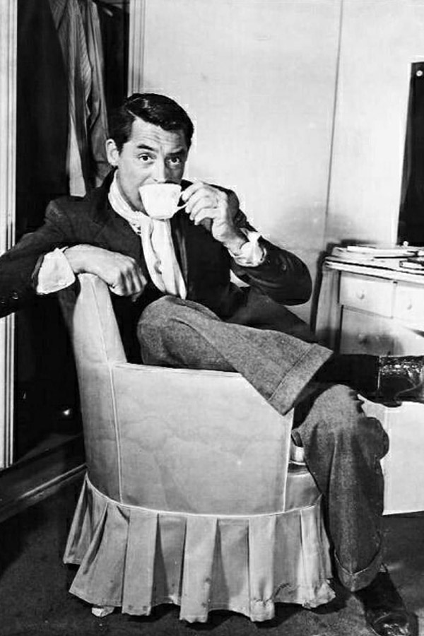 Cary Grant sipping coffee in style.