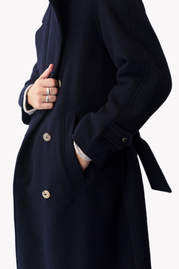 Navy blue wool trenchcoat.