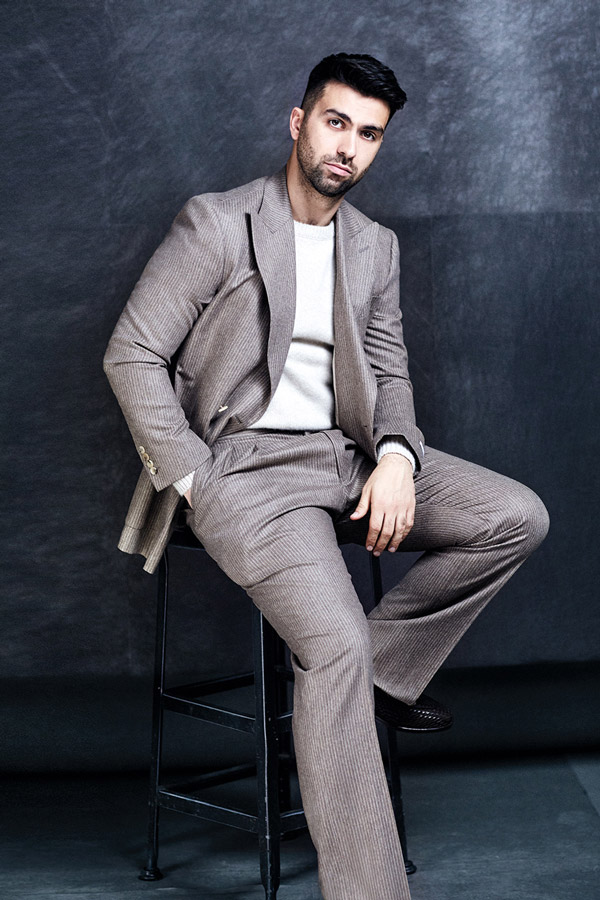 Beige cashmere and wool soft chalkstripe suit, Richard James at The Rake; cream cashmere jumper, Connolly; mahogany Brando woven leather loafers, Belsire at The Rake.