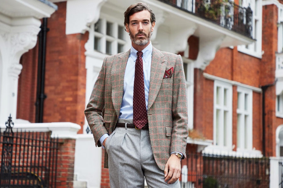 Richard Biedul wears an Edward Sexton Prince of Wales check sports jacket designed exclusively for The Rake, with Edward Sexton’s Hollywood-top trousers. Photo by James Munro.