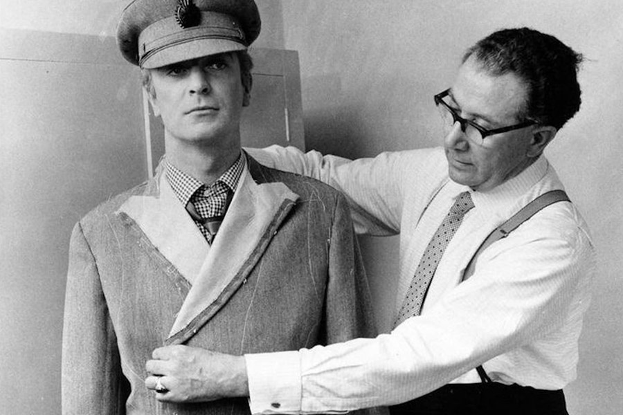 Michael Caine being fitted by his tailor, the celebrated Doug Hayward.