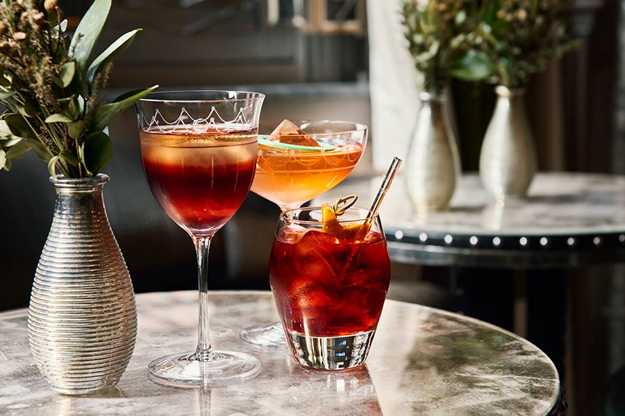 The Connaught Bar's three variations of the Negroni: 'Negroni 10 to 100'; 'Sweet and Z' and the classic Negroni.