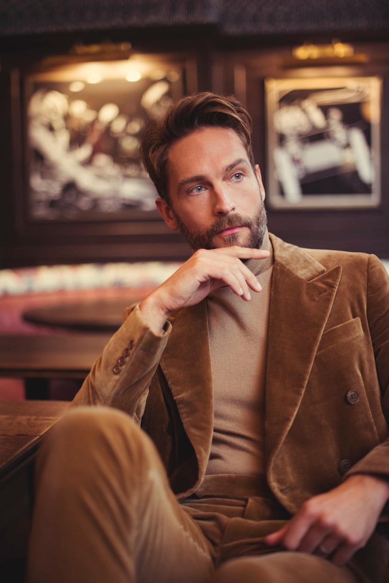 Beige velvet cotton double-breasted blazer suit and camel cashmere sweater, Ralph Lauren Purple Label.