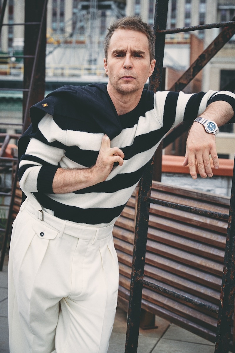 Black cashmere blazer, black and white striped cashmere jumper, and white pleated luxor cotton trousers, all Lardini; Alpine Eagle watch in steel with a blue dial, Chopard.