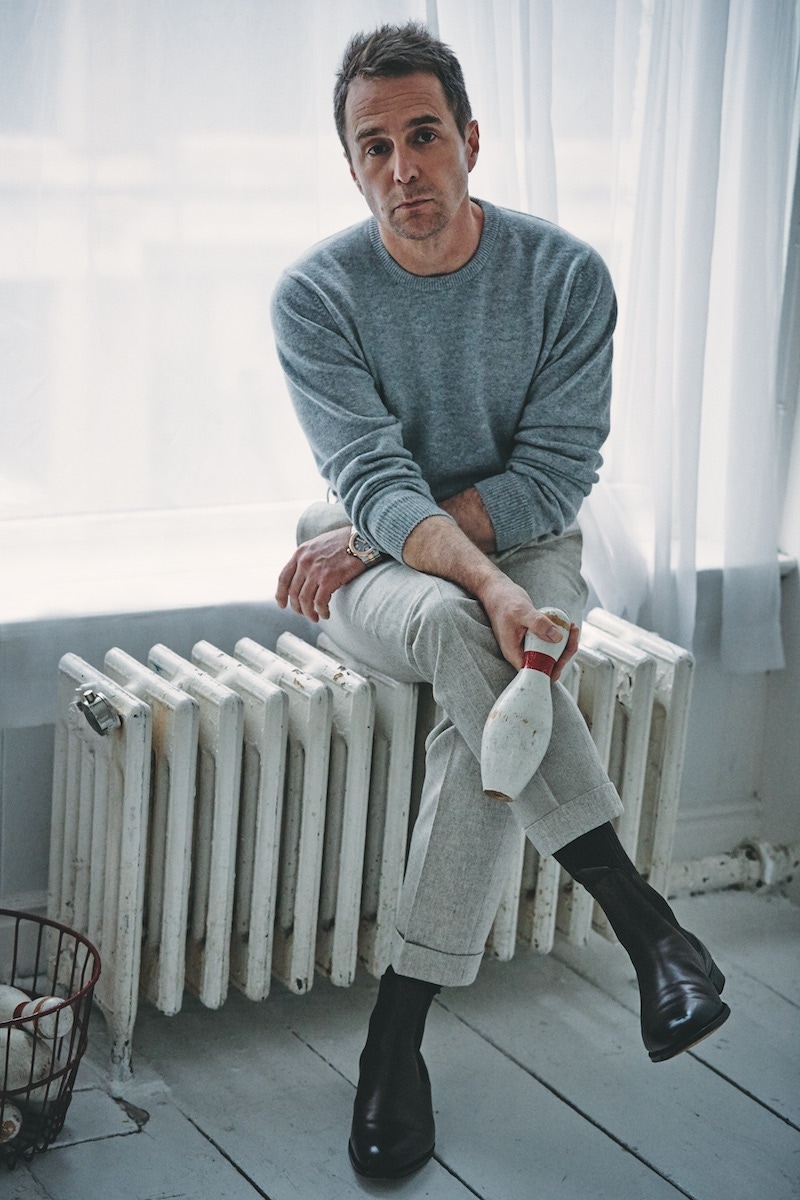 Grey cashmere crewneck jumper, Johnstons of Elgin; beige wool trousers, Lardini; brown cotton socks, London Sock Company; dark oak leather boots, Edward Green at The Rake; Alpine Eagle watch in rose-gold and steel with state colour dial, Chopard; Belt, stylist's own.