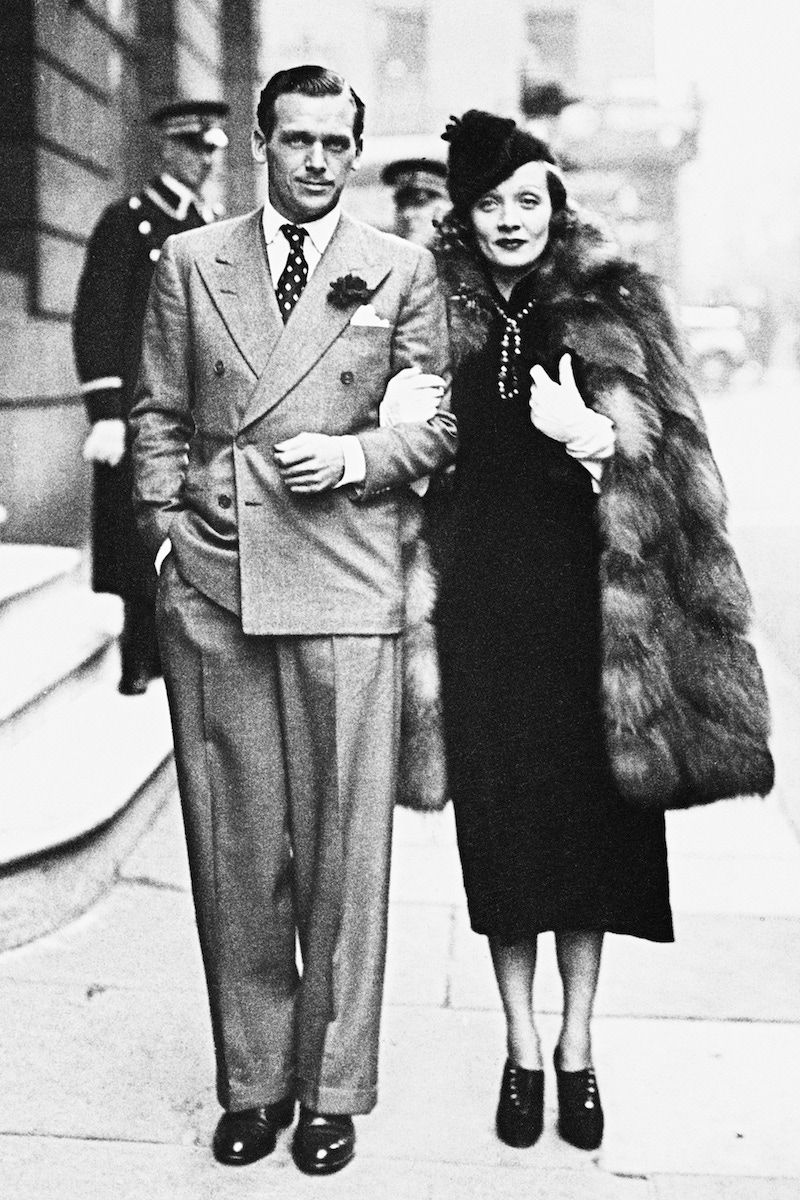 Arm in arm with Douglas Fairbanks Jr in 1937. (Photo courtesy of Getty)