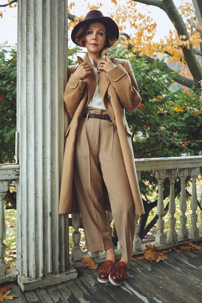 Camel Loro Piana wool Naphill greatcoat, Kit Blake; ivory silk shirt, Emma Willis; camel virgin wool trousers and brown leather belt, both Brunello Cucinelli; tan calf leather tassel loafers; Grenson; burgundy felt fedora, Lock & Co.