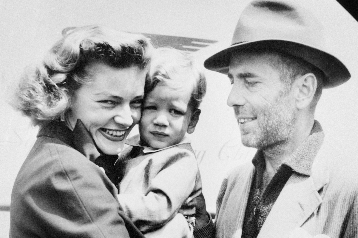 Mother and fatherare reunited with their two-year-old son, Stephen, at an airport in London after finishing the shooting of 1951's The African Queen. Image by © Bettmann/CORBIS