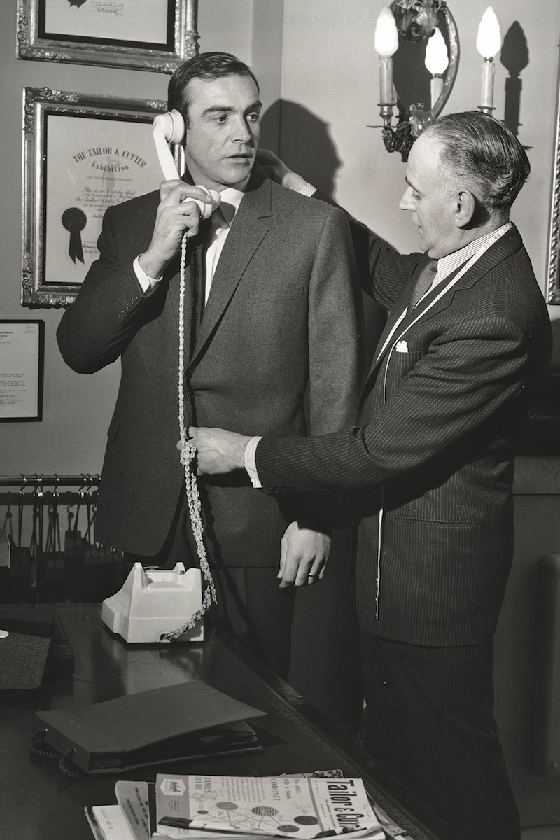 Anthony Sinclair fitting Connery. Photo by Harry Myers/Shutterstock