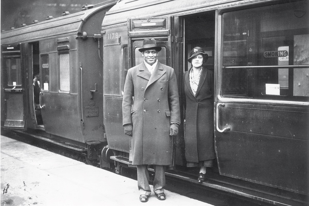 Paul Robeson and his wife, Eslanda leaving Waterloo station, London. (Photo by H F Davis/Getty Images)