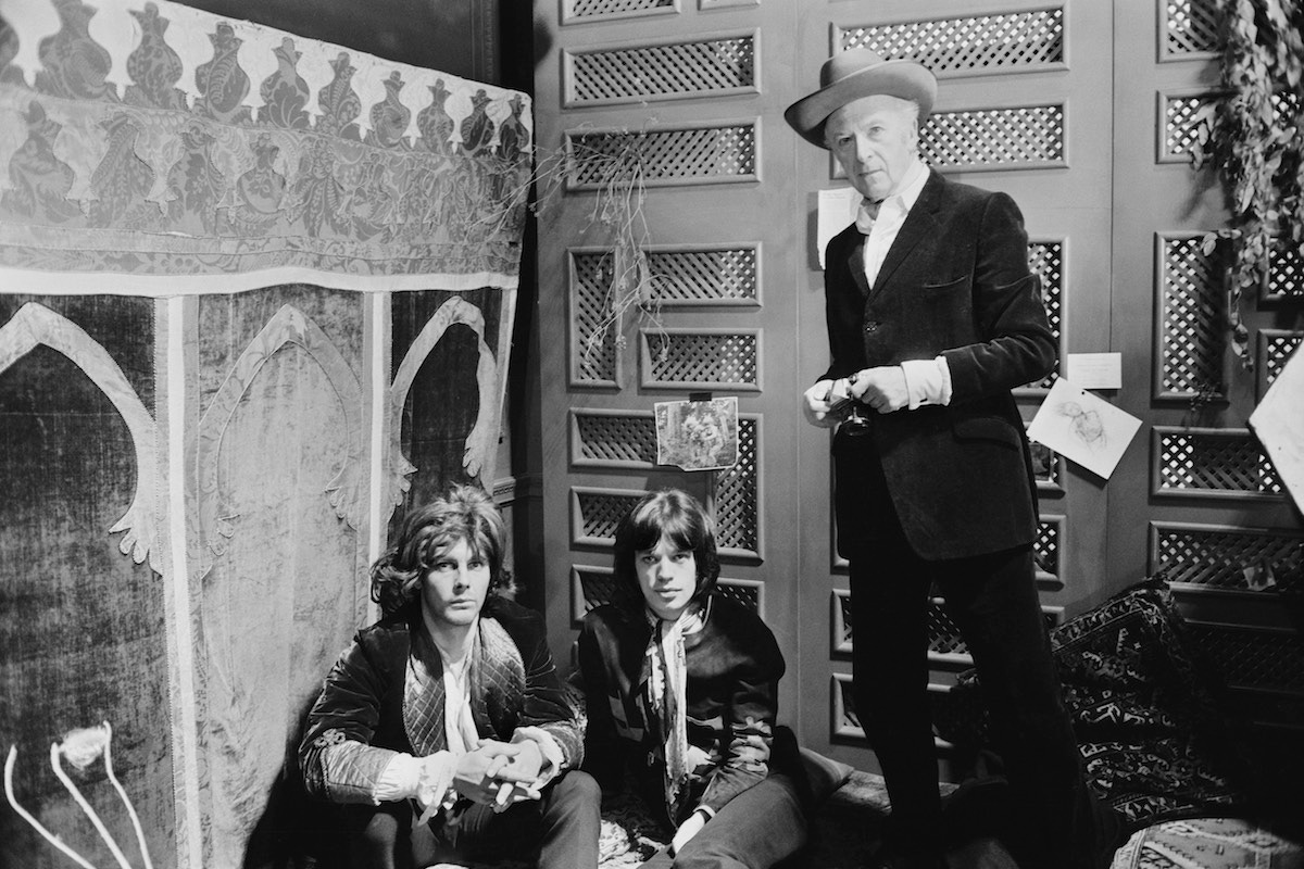 Left to right: James Fox, Mick Jagger and photographer Cecil Beaton on the set of the crime drama 'Performance', London, 2nd November 1968 (Photo by David Cairns/Daily Express/Hulton Archive/Getty Images)