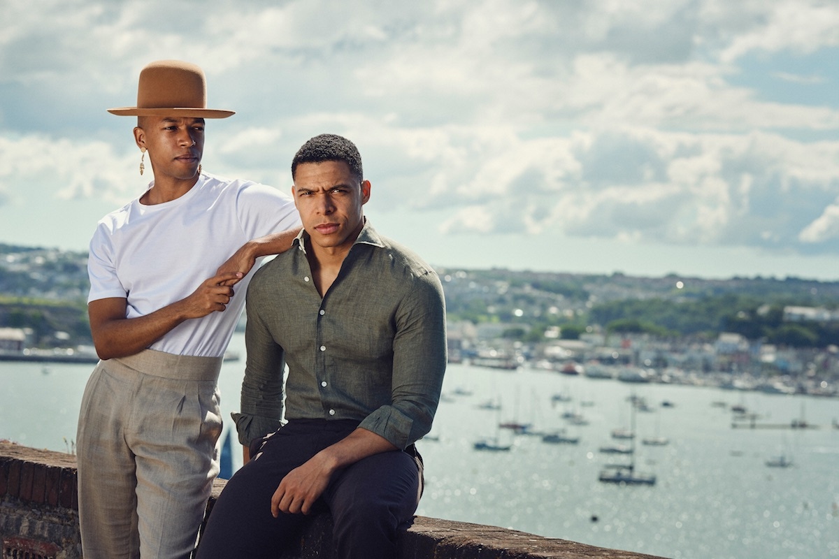 Solomon: White cotton T-Shirt, Sunspel; beige linen Capelli trousers, Yuri & Yuri at The Rake. Hat and earrings, Solomon’s own. Kidane: Forest green linen shirt, 100 Hands at The Rake; brown linen trousers, G. Inglese at The Rake.