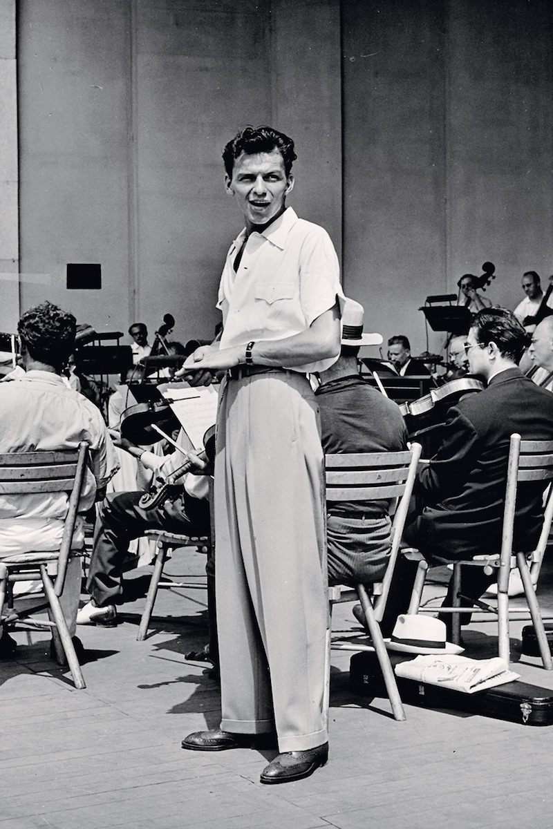 Sinatra during a soundcheck, with Max Steiner conducting the orchestra at Lewisohn Stadium in New York, 1943 (Photo by George Karger/Pix Inc./The LIFE Images Collection via Getty Images/Getty Images)