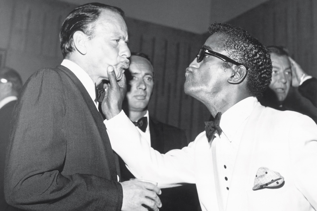 With Frank Sinatra at a charity dinner in July 1961