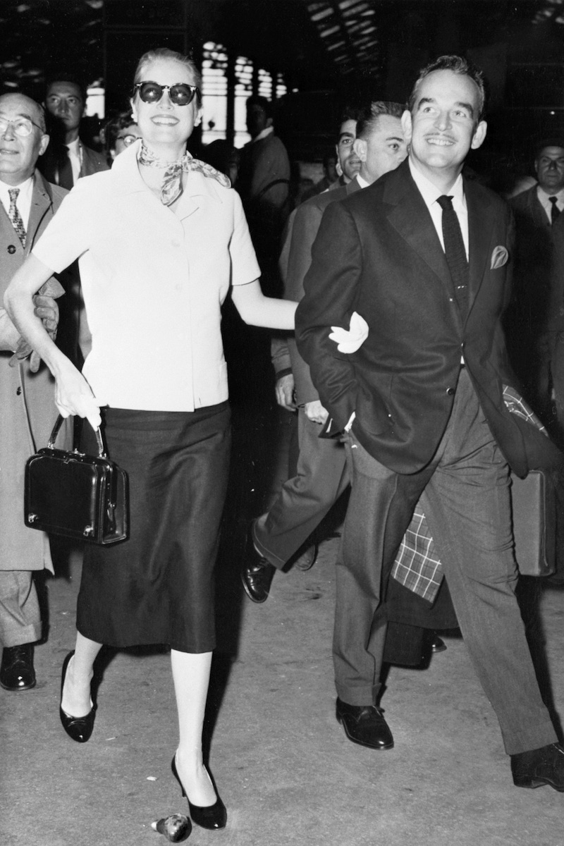 Prince Rainier of Monaco and Princess Grace walk arm in arm at the railroad station in Paris on their arrival from Monaco., September 4, 1956 (Image by © Bettmann/CORBIS)