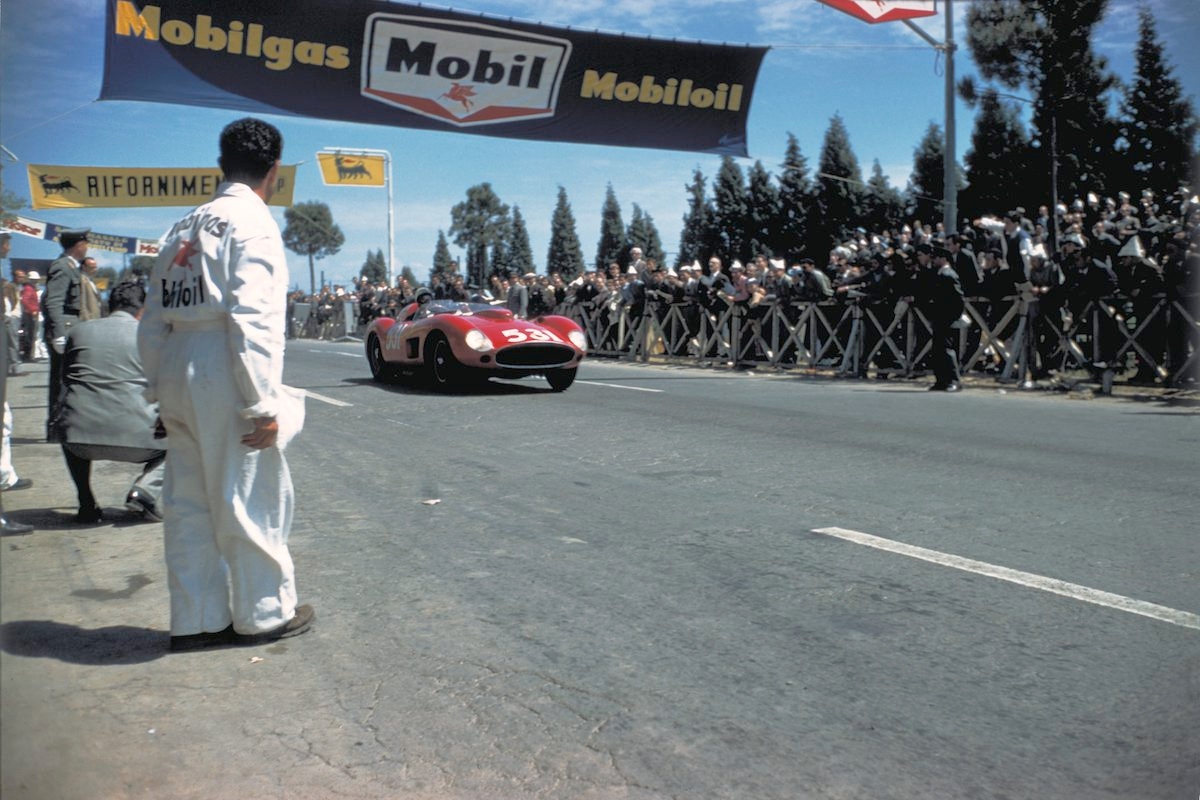 Alfonso de Portago with his navigator Edmund Gurner Nelson accelerates away from the Rome control in fourth place. They later crashed not far from the finish at Brescia, killing themselves and nine spectators. (Photo by Klemantaski Collection/Getty Images)