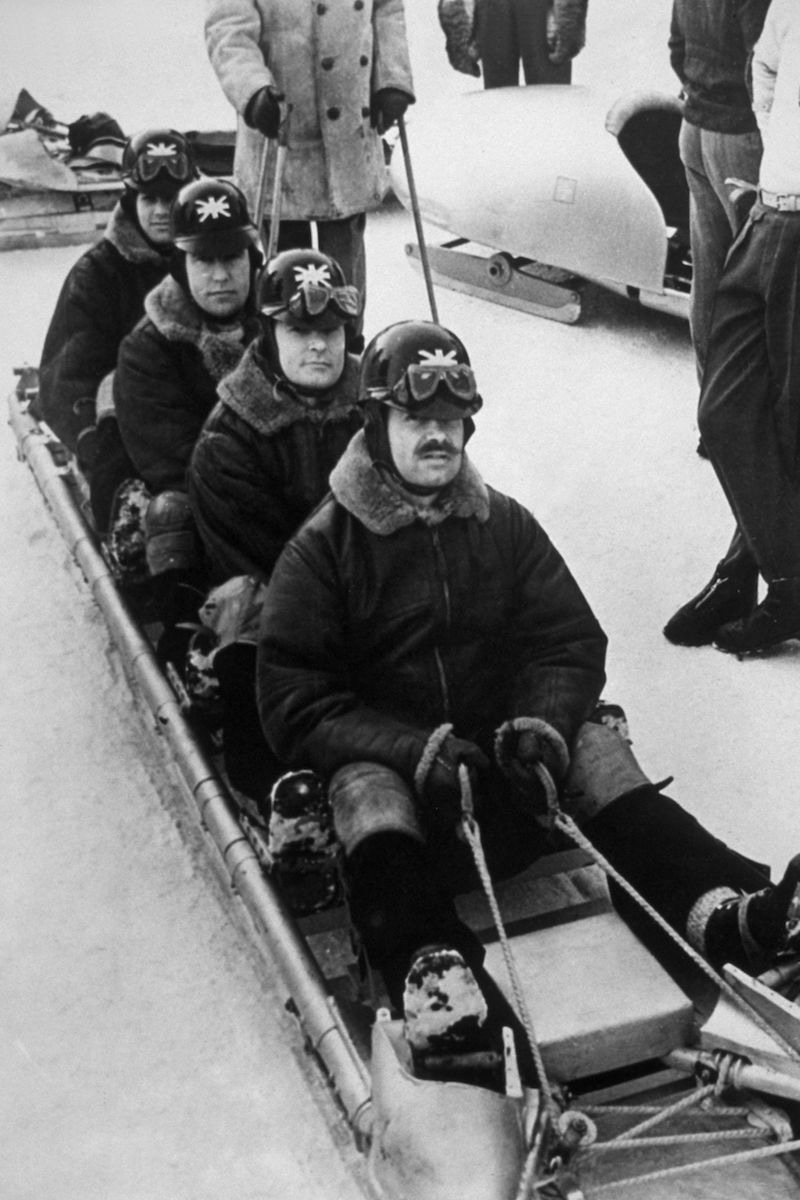Britain's bobsleigh team prepare for the Cresta Run during their training at the 1948 St. Moritz Winter Olympics. (Photo by Keystone/Getty Images)
