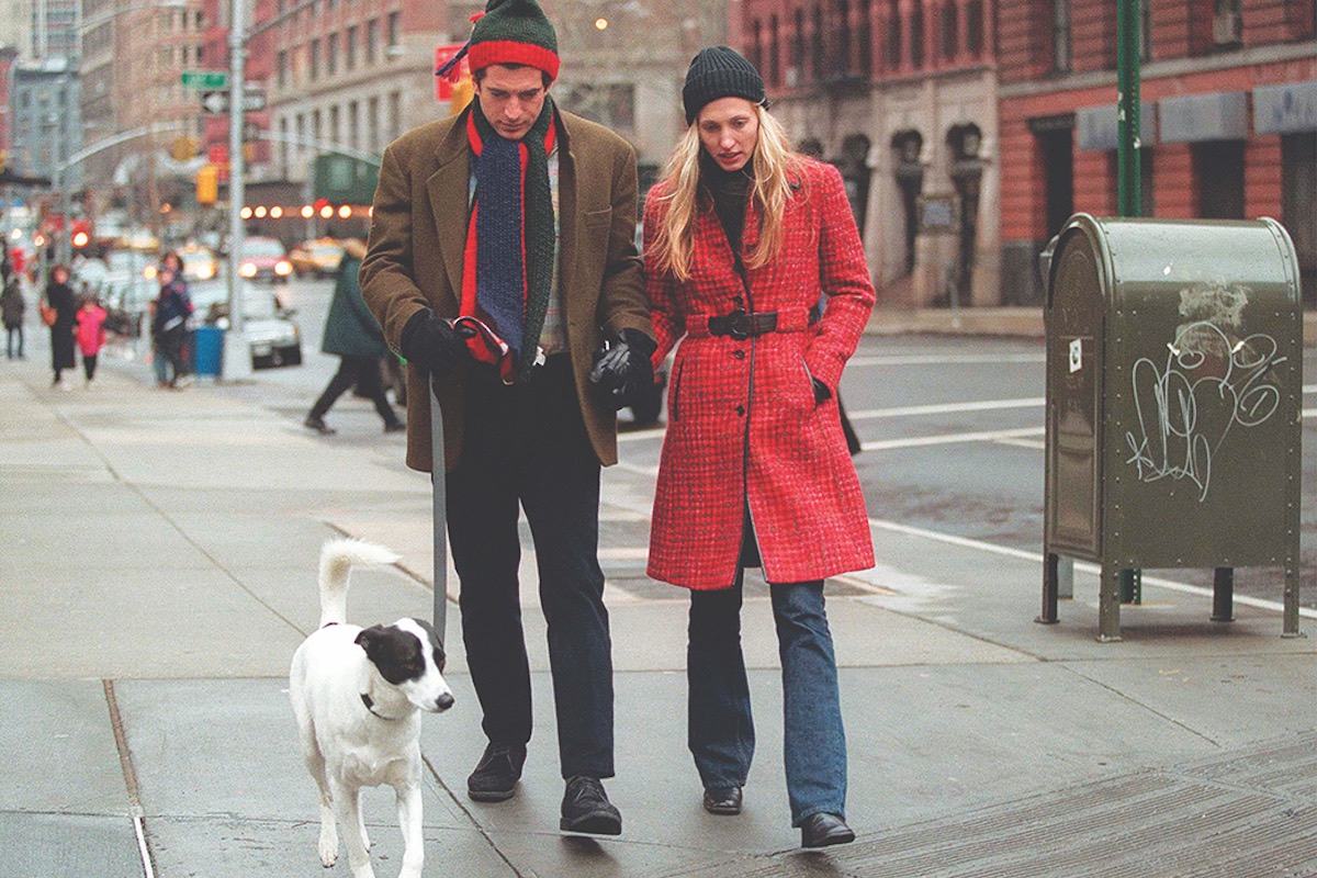 John F. Kennedy Jr. and his wife Carolyn walk with their dog in New York City, 1997 (Photo by Evan Agostini/Liaison via Getty)