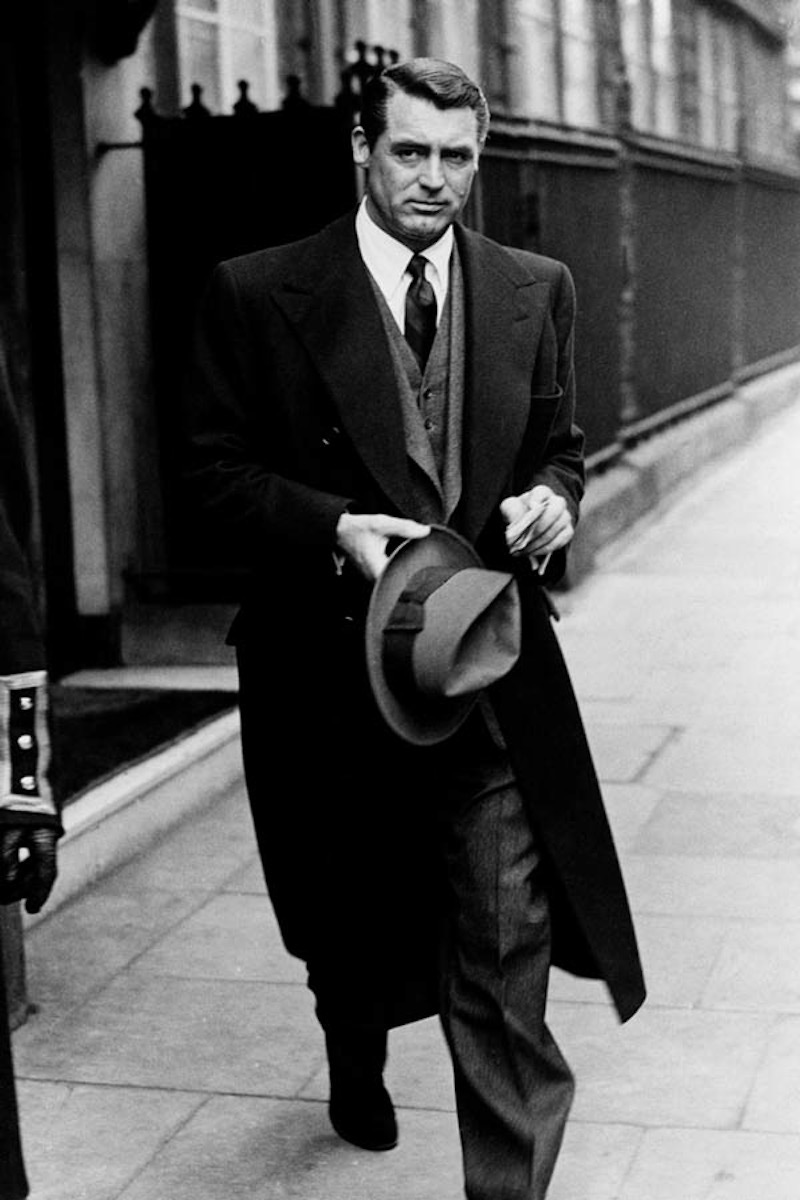 Cary Grant leaving Claridges Hotel