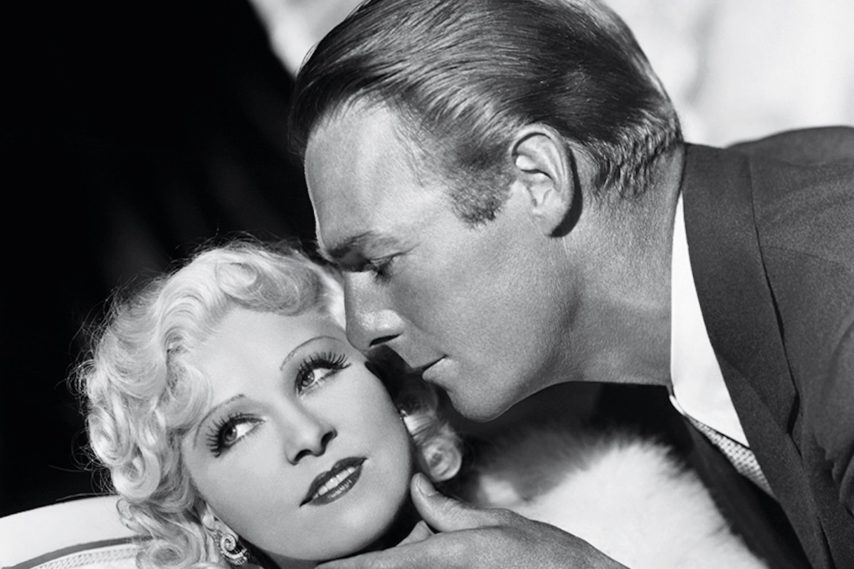 Randolph Scott caresses Mae West's chin in Go West Young Man, 1936