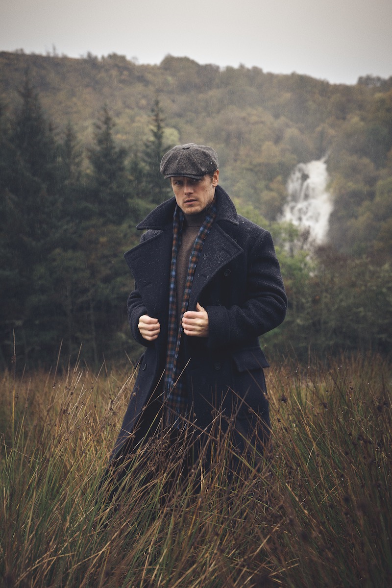 Bespoke navy wool greatcoat, Anderson & Sheppard; brown wool roll-neck, Walker Slater; cashmere scarf, Joshua Ellis; Shetland tweed trousers, Walker Slater at The Rake; Sandwich tweed cap, Lock & Co