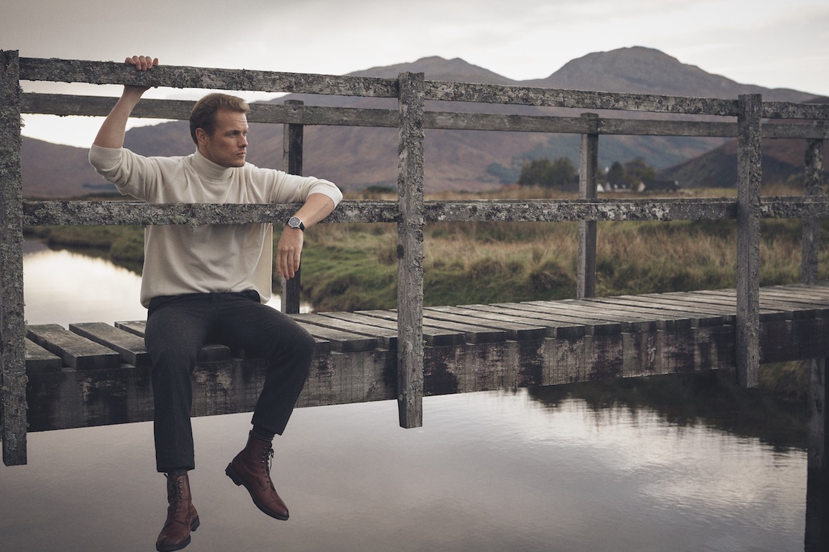 Cream cashmere roll-neck, New & Lingwood; Shetland brown Donegal trousers, Walker Slater at The Rake; Damson Utah ‘Galway’ boots, Edward Green at The Rake; Scottish Lisle cotton socks, The London Sock Company at The Rake; Code 11.59 by Audemars Piguet Selfwinding Chronograph,18-carat white-gold case, lacquered black dial and counters. Black alligator strap with white-gold buckle.