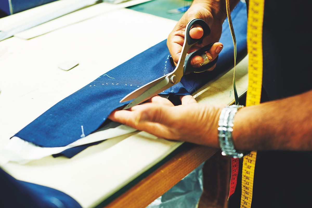 A demonstration of the different handcrafted techniques that go into a bespoke suit: cutting