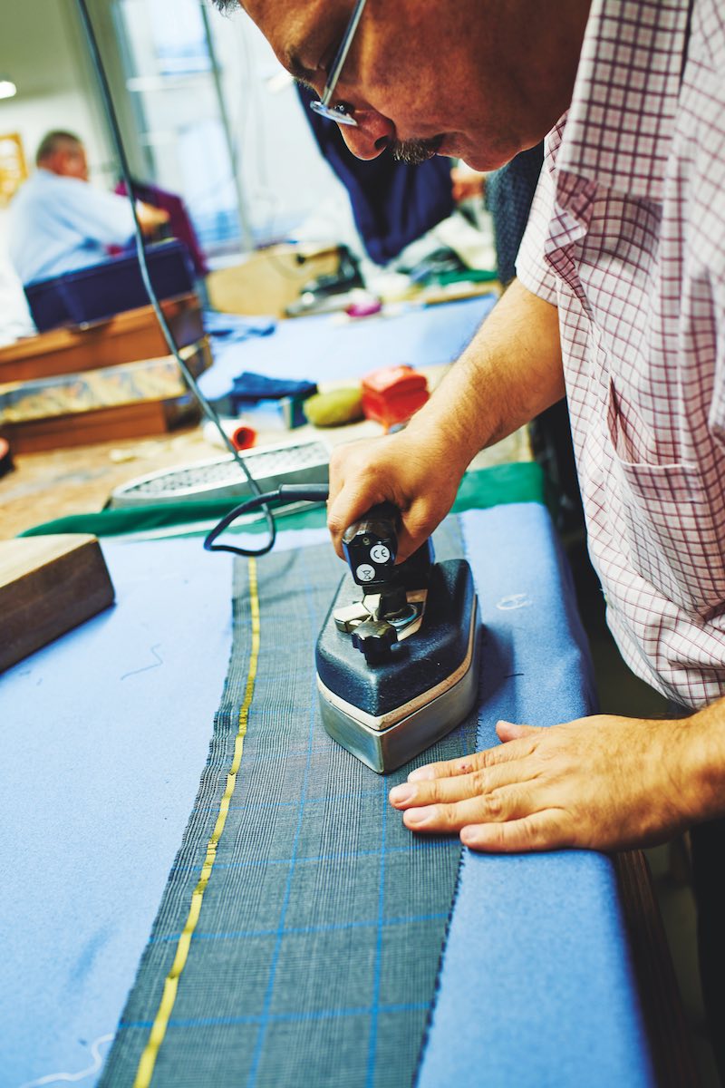 A demonstration of the different handcrafted techniques that go into a bespoke suit: ironing