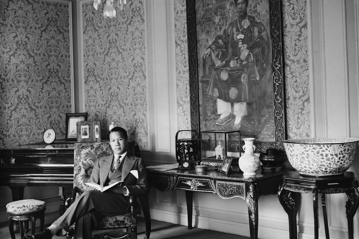 Reading at his residence in France in his youth (Photo by © Hulton-Deutsch Collection/CORBIS/Corbis via Getty Images)