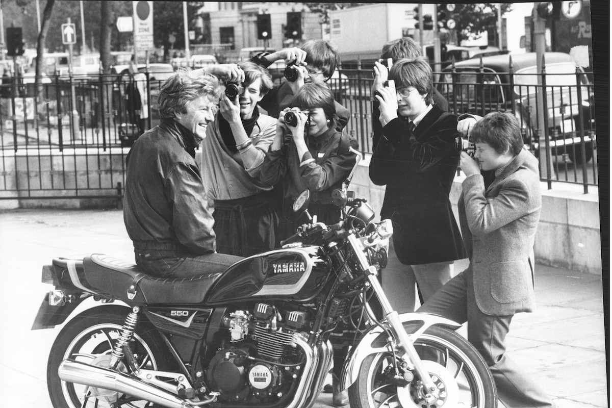 Posing on his motorcycle for the winners of a Woolworth's photography competition Photo by Ted Blackbrow/ANL/REX/Shutterstock (2010844a)