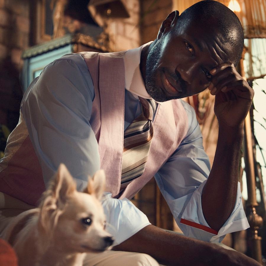 Blue cotton cutaway collar shirt, Udeshi at The Rake; multicolour silk striped tie, Tie Your Tie at The Rake; pink linen double-breasted waistcoat, Favourbrook; cream wool pleat front trouser, Ralph Lauren.