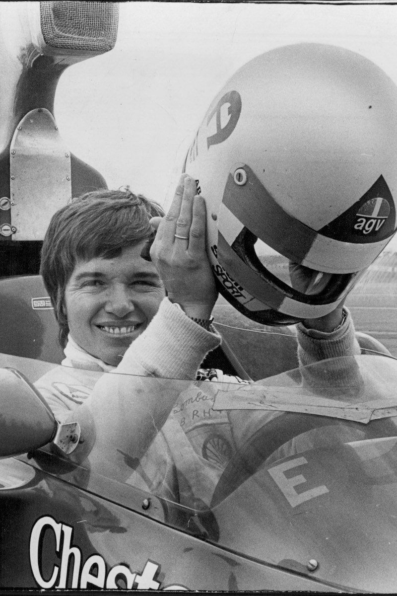 Miss Lella Lombardi, Italian female racing car driver trying out the size of Kevin Bartlett's Lola F5000 at Oran Park, 1974 (Photo by Wayne Russell Black/Fairfax Media via Getty Images)