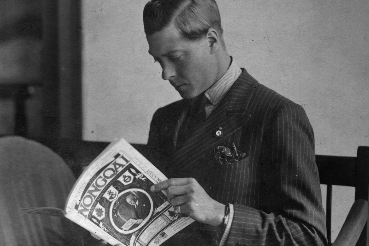 Edward, Prince of Wales (1894 - 1972)  on tour in the Union of South Africa, reading the magazine 'Nongoa'. (Photo by Alan Yates/Hulton Archive/Getty Images)