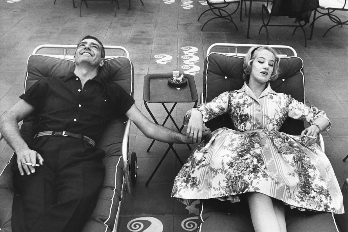 Francisco (Baby) Pignatari (L) and model Barbara Cailleux relaxing beside the hotel's pool. (Photo by Ralph Crane//Time Life Pictures/Getty Images)
