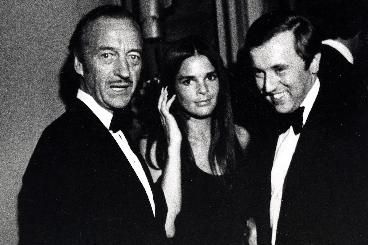 David Niven with Ali MacGraw and David Frost, 1971 (Photo by Ron Galella/WireImage)