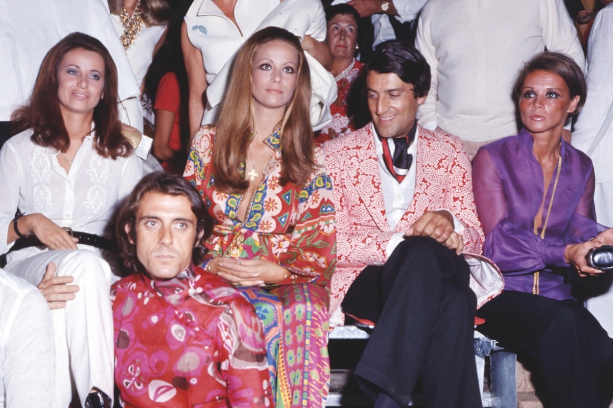 With French actress Claudine Auger and designer Nino Cerruti, circa 1970