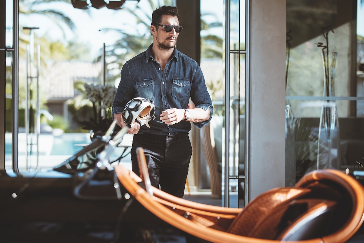 Gandy walks to his Jaguar XK120 (Photo by Patrick Gosling /Jaguar via Getty Images)