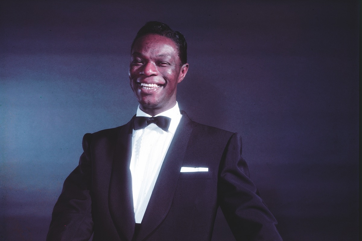 American pop and jazz vocalist/pianist Nat King Cole dressed in formal wear, as he poses in front of a piano, 1954. (Photo by Eliot Elisofon/The LIFE Picture Collection via Getty Images)