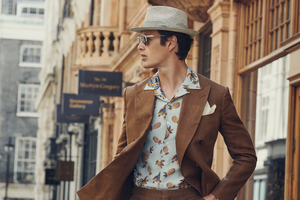 Tobacco Irish linen double-breasted jacket and trousers. Hat by Hat of Cain, shirt by Barbanera, sunglasses by Curry & Paxton.