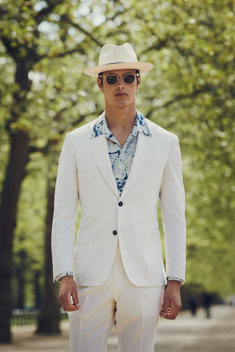 Off-white gabardine jacket and trousers. Hat by Anderson & Sheppard, shirt by Barbanera, sunglasses by Curry & Paxton.