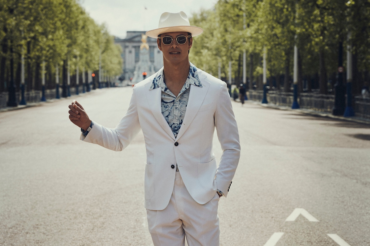 Off-white gabardine jacket and trousers. Hat by Anderson & Sheppard, shirt by Barbanera, sunglasses by Curry & Paxton.