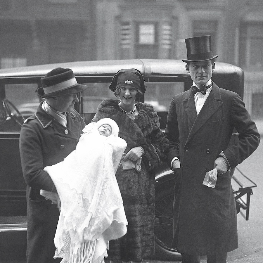 Lord and Lady Glenconner arrive with their son Colin for his christening in London